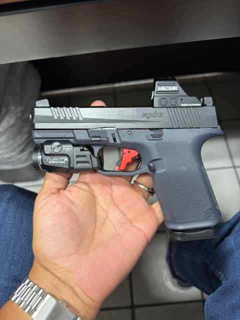 RXM with Holosun and TLR7X 